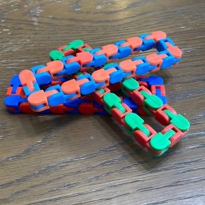 24 Piece wacky tracks. 15 extra green and orange pieces, and 9 blue and orange.